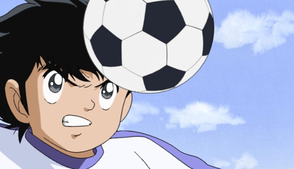 una escena de oliver y benji con el balon de futbol