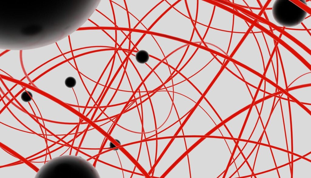 Imagen abstracta de líneas rojas y puntos negros